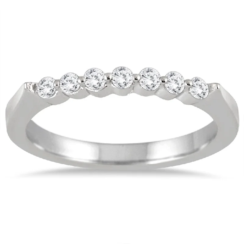 Cathedral - Style Women's Diamond Rings with a Raised Center Setting and Elaborate Metalwork1/4 Carat TW Seven Stone Diamond Wedding Band in 14K White Gold