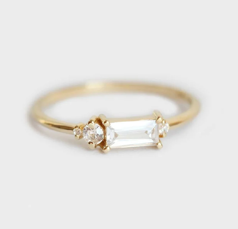 Pear - Shaped Women's Diamond Rings in Yellow Gold with a Single - Diamond Pendant LookBaguette Diamond Ring, Baguette Engagement Ring