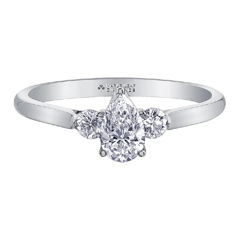 Channel - Set Women's Diamond Rings with Diamonds Securely Held in a Metal Groove for DurabilityPear-Shaped Canadian Diamond Three-Stone Ring