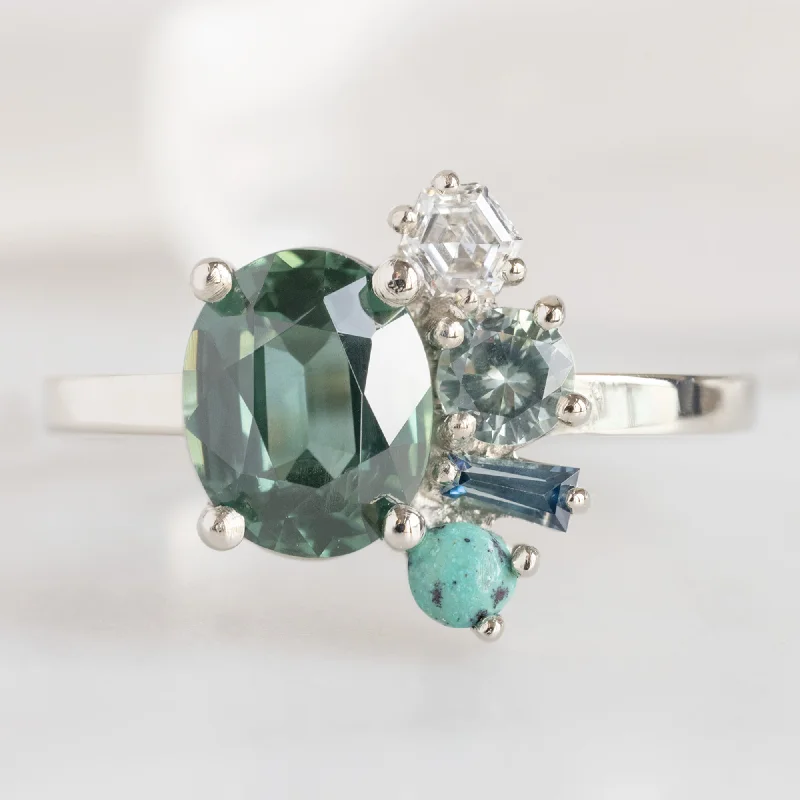 Men's Alexandrite Engagement Rings in Platinum with a Hidden Halo of DiamondsThe Watercolor Cluster Ring | 1.53ct Oval Green Sapphire in 14K White Gold