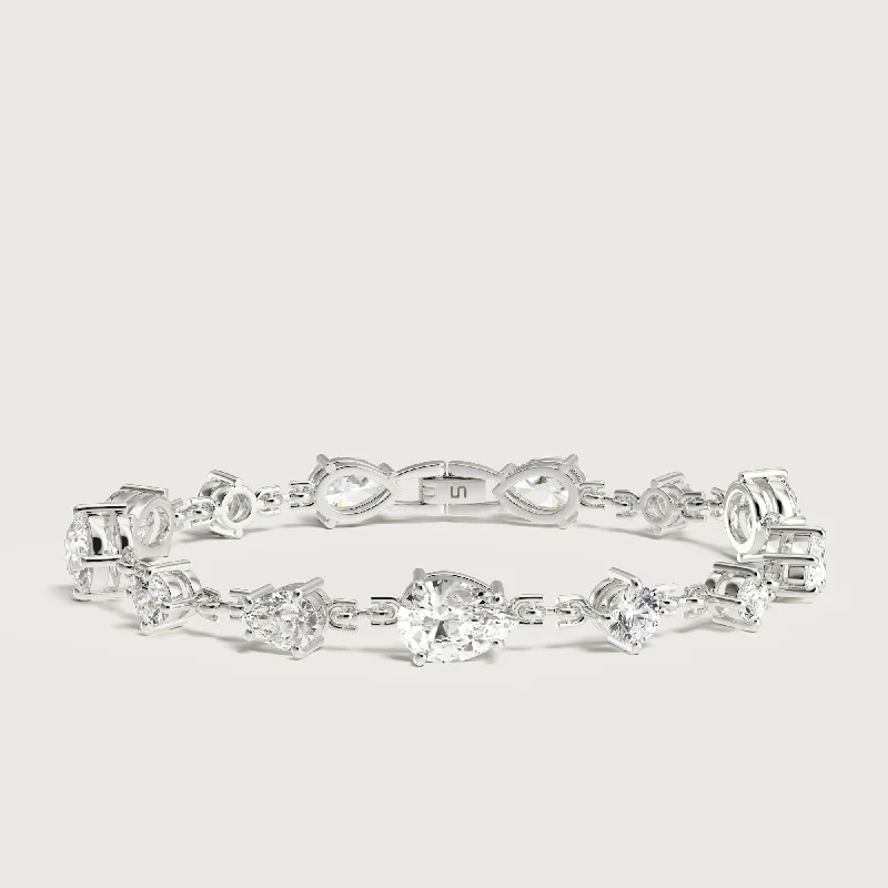 Asscher - cut diamond engagement ring with a pavé - set eternity band in platinumOgee tennis bracelet