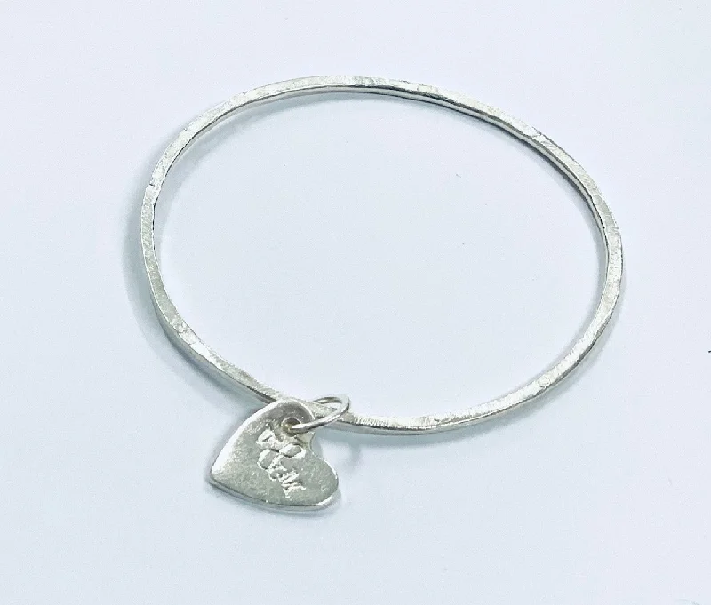 Unisex Bangle Bracelets with Abstract Artwork for a Unique StatementThin silver bangle with heart