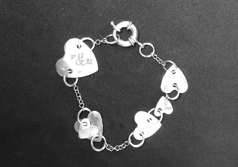 Adjustable Bangle Bracelets with Magnetic Closures for Easy Wear and RemovalChain of hearts silver bracelet