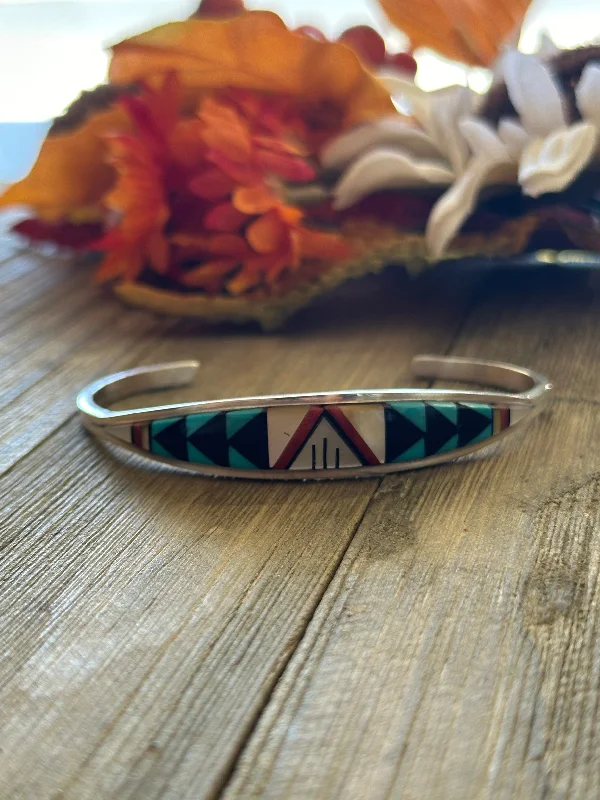 Wooden Women's Cuff Bracelets with Carved Motifs for a Natural and Artistic LookZuni Made Multi Stone & Sterling Silver Inlay Cuff Bracelet