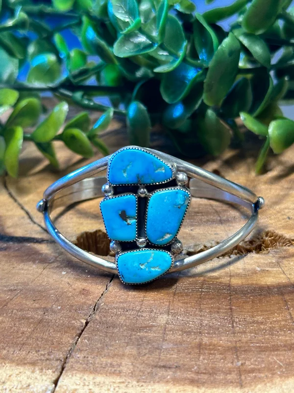 Women's Sterling Silver Cuff Bracelets with Engraved Floral Patterns for a Romantic LookJohn Begay Kingman Turquoise & Sterling Silver Cluster Cuff Bracelet