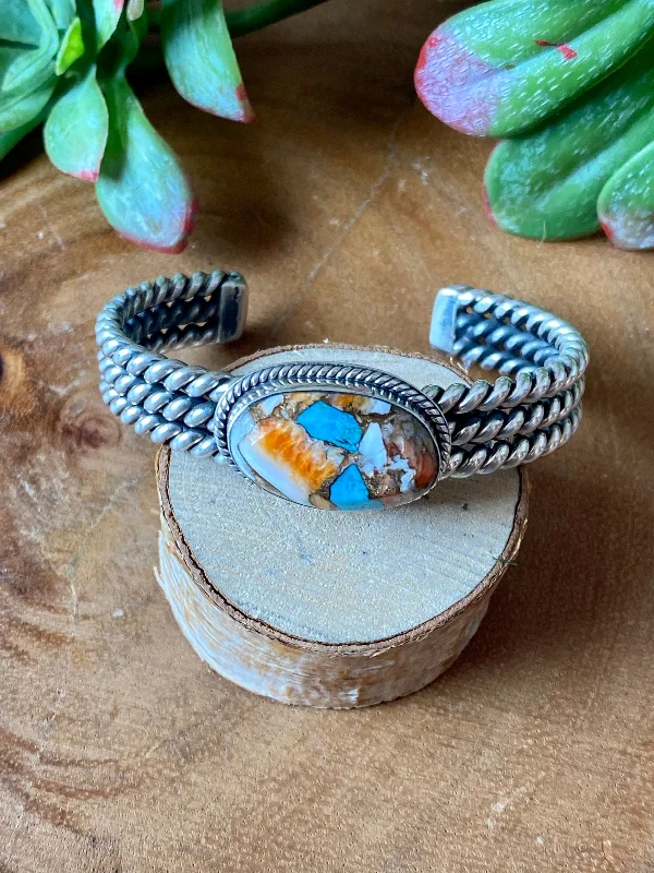 Wooden Women's Cuff Bracelets with Carved Motifs for a Natural and Artistic LookNavajo Made Mohave Turquoise & Sterling Silver Cuff Bracelet