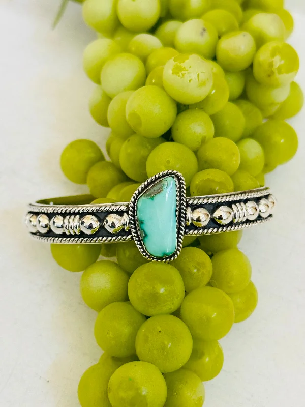 Large - Sized Women's Leather Cuff Bracelets with Studded Details for a Punk - Rock VibeSouthwest Made Emerald Valley Turquoise & Sterling Silver Cuff Bracelet