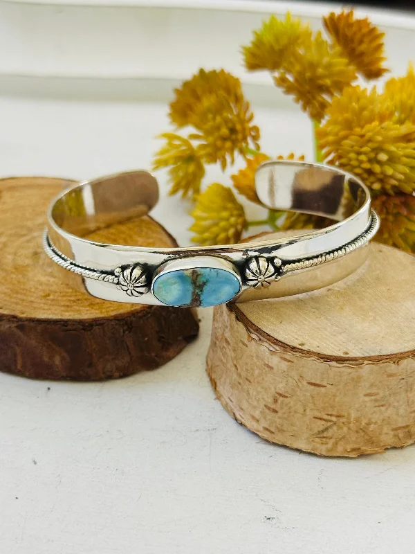 Adjustable Women's Elastic Cuff Bracelets with Pearl Accents for a Feminine TouchSouthwest Made Golden Hills Turquoise & Sterling Silver Cuff Bracelet