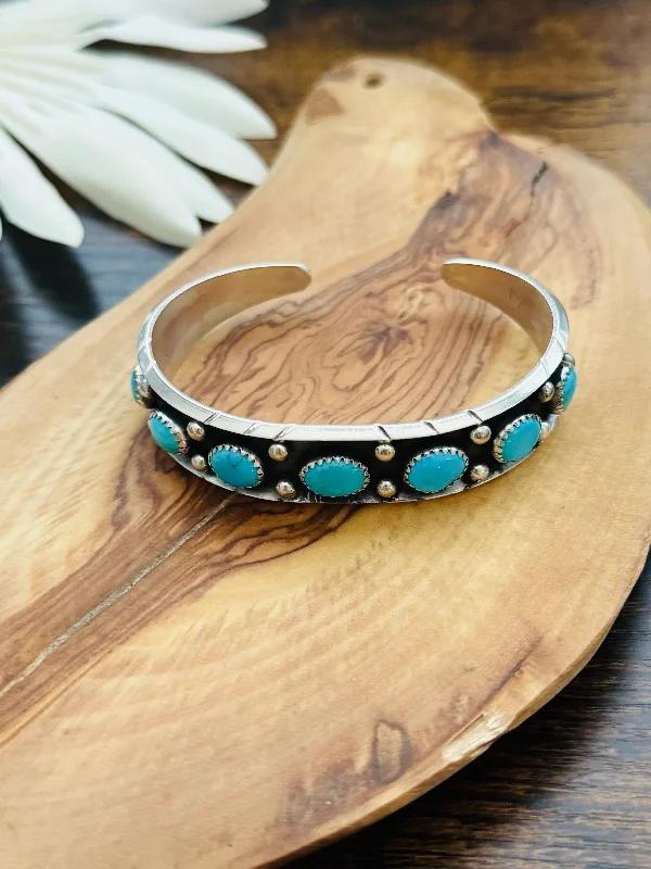 Wooden Women's Cuff Bracelets with Carved Motifs for a Natural and Artistic LookNavajo Made Kingman Turquoise & Sterling Silver Cuff Bracelet