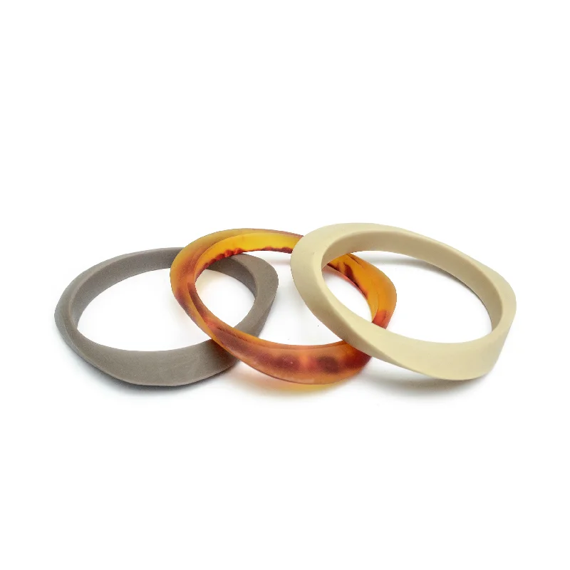 Stretch Bangle Bracelets with Elastic Cord for a Comfortable FitNaxos Triple Resin Bangle Set