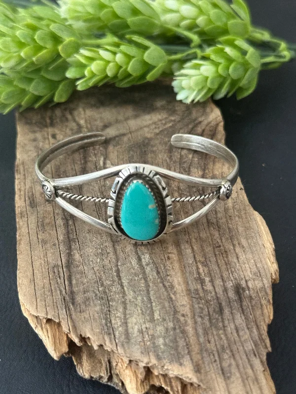 Adjustable Women's Elastic Cuff Bracelets with Pearl Accents for a Feminine TouchRobert Shakey Kingman Turquoise & Sterling Silver Cuff Bracelet