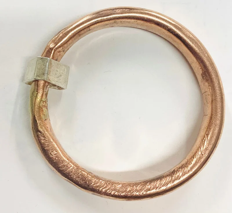 Stretch Bangle Bracelets with Elastic Cord for a Comfortable FitAnvil bangle copper with silver shape