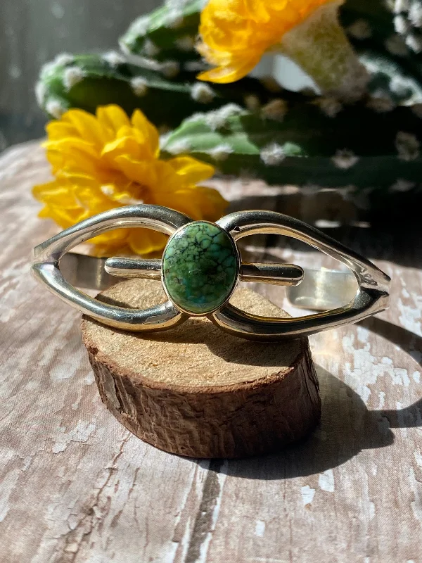 Women's Cuff Bracelets with Celtic Knot Patterns for a Mysterious and Cultural AppealNavajo Made Sonoran Gold Turquoise & Sterling Silver Cuff Bracelet