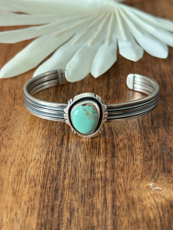 Stackable Women's Cuff Bracelets in Different Sizes and Materials for Layered StylingNavajo Made Kingman Turquoise & Sterling Silver Cuff Bracelet