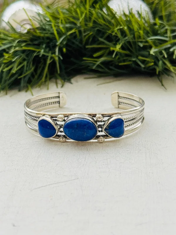 Gold - Plated Women's Cuff Bracelets with Precious Gemstone Inlays for Luxury and EleganceNavajo Made Lapis & Sterling Silver Cuff Bracelet