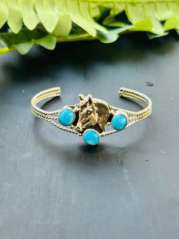 Leather - and - Metal Combo Women's Cuff Bracelets in Rustic Brown for a Western StyleNavajo Made Sleeping Beauty Turquoise and Sterling Silver Horse Cuff Bracelet