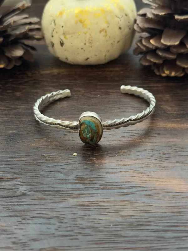 Stackable Women's Cuff Bracelets in Different Sizes and Materials for Layered StylingNavajo Made Royston Turquoise & Sterling Silver Cuff Bracelet