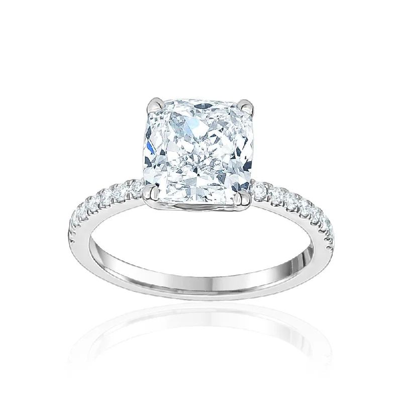 Classic Round Cut Engagement Rings with Platinum Prongs and Halo Setting for Timeless EleganceFour Prong Cushion Cut Engagement Ring