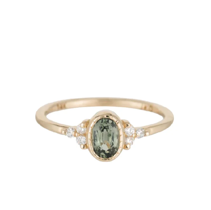 Pear - Shaped Engagement Rings in Yellow Gold with a Diamond - Encrusted BandOval Green Sapphire Cluster Ring