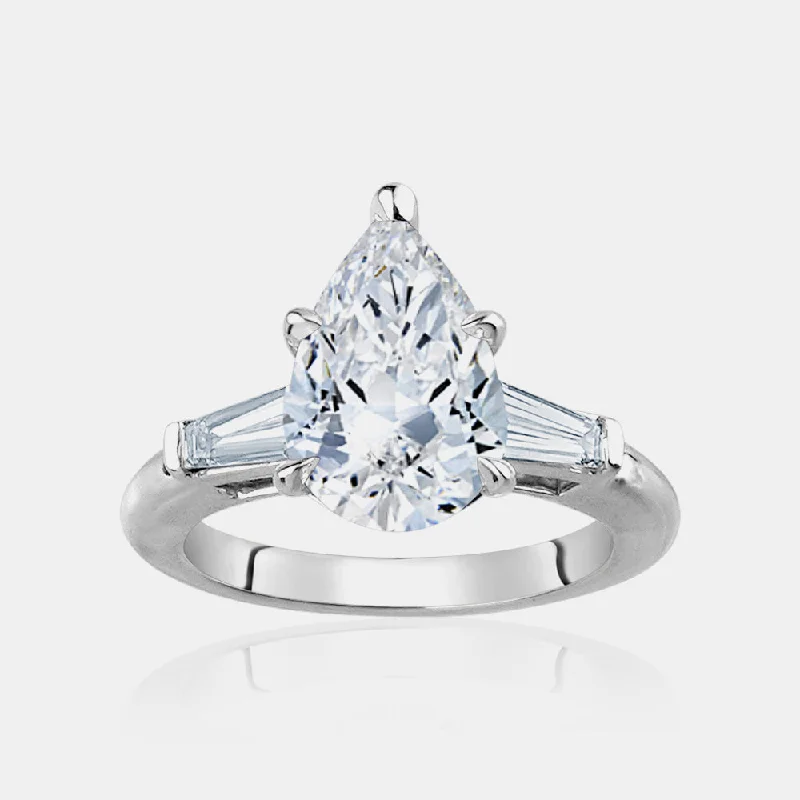 Three - Stone Engagement Rings Symbolizing Love's Past, Present, and Future with Asscher - Cut DiamondsPear Shape Engagement Ring with Trapezoids side stones