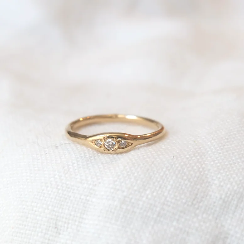 Halo Engagement Rings with a Cushion - Cut Center Diamond and Rose Gold BandTrio Ring Diamond