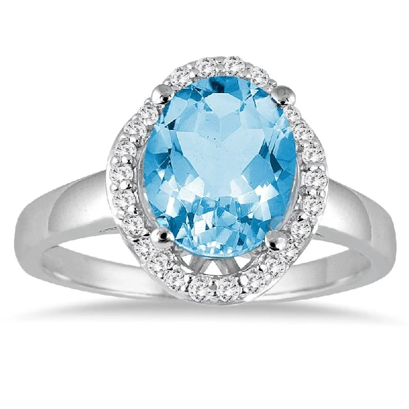 Sapphire Gemstone Rings in 18K White Gold with Diamond Accents for an Elegant Engagement3 1/2 Carat Oval Blue Topaz and Diamond Ring in 14k White gold