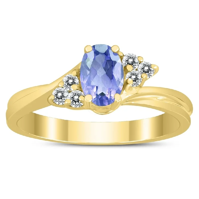 Iolite Gemstone Rings in 10K Gold with a Twisted Band for a Distinctive and Stylish Accessory6X4MM Tanzanite and Diamond Twist Ring in 10K Yellow Gold