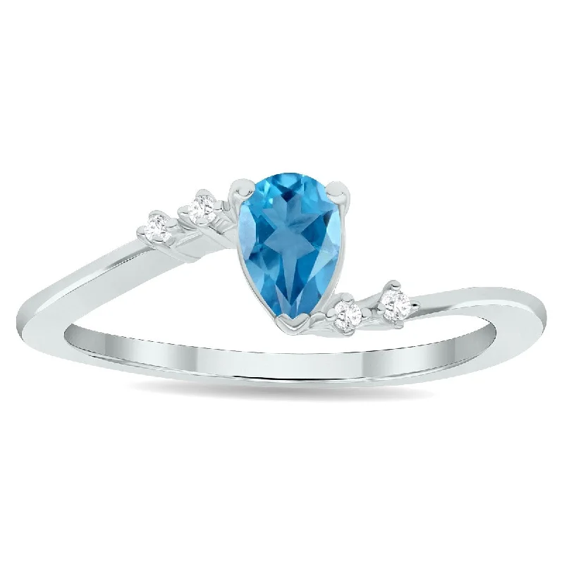 Aquamarine Gemstone Rings in 9K Gold with a Bezel Setting for a Modern and Secure FitWomen's Blue Topaz and Diamond Wave Ring in 10K White Gold