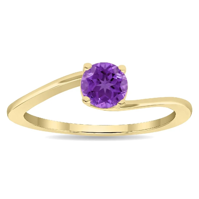 Iolite Gemstone Rings in 10K Gold with a Twisted Band for a Distinctive and Stylish AccessoryWomen's Round Shaped Solitaire Amethyst Wave Ring in 10K Yellow Gold