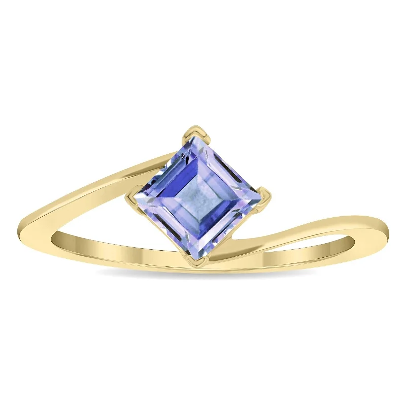 Malachite Gemstone Rings in 14K Gold with a Carved Stone for a Unique and Artistic AppealWomen's Solitaire Square Shaped Tanzanite Wave Ring in 10K Yellow Gold