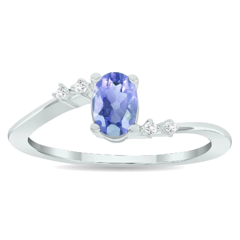 Tanzanite Gemstone Rings in 10K Gold with a Trilogy Design for a Sophisticated GiftWomen's Tanzanite and Diamond Tierra Ring in 10K White Gold